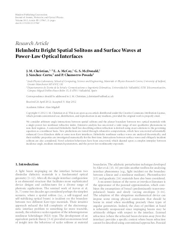 Helmholtz bright spatial solitons and surface waves at power-law optical interfaces Thumbnail